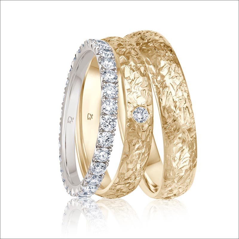 Ringpaar Silber Rotgold Hammerschlag Brillant